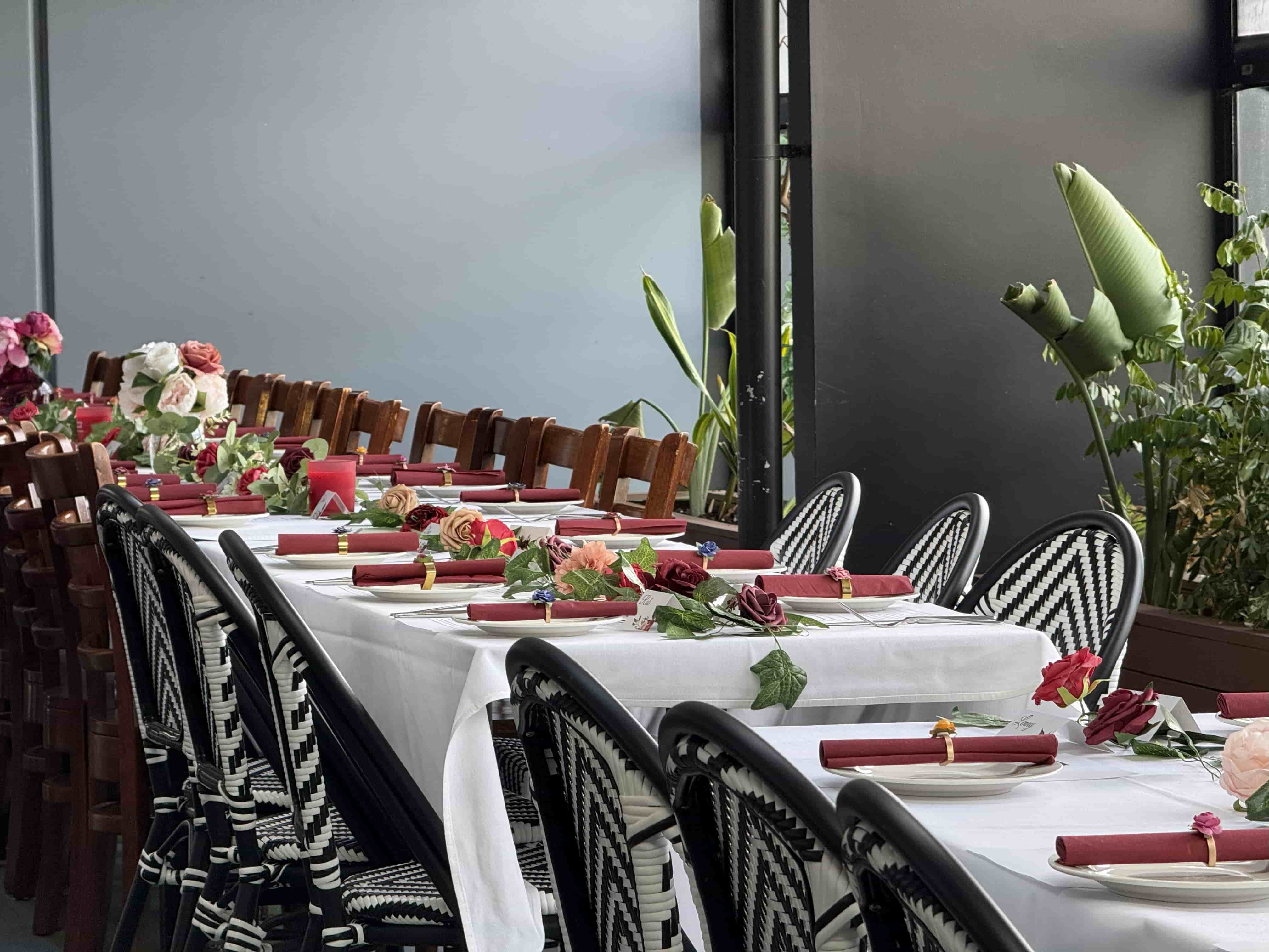 Long table set with platters and glasses, ready for a relaxed group booking