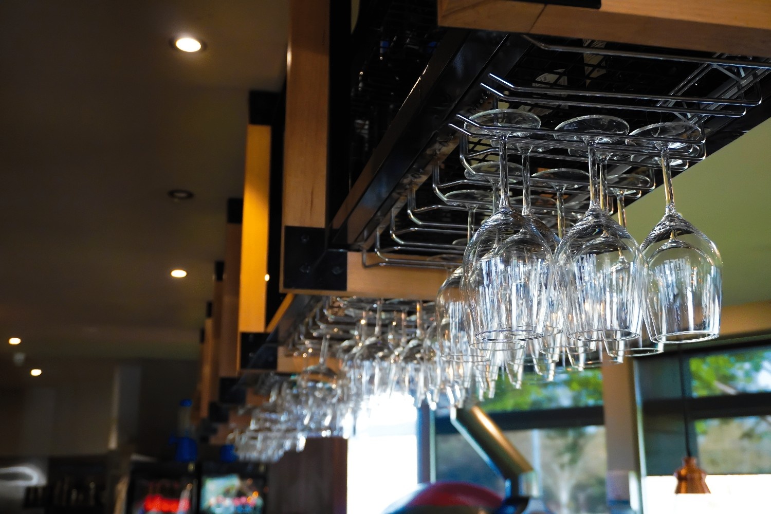 Bar glassware hanging above the counter